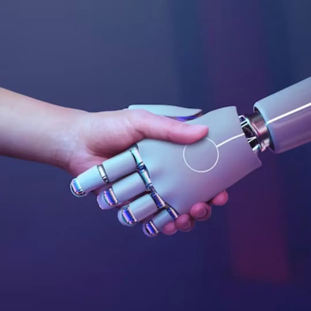 A human hand shakes a robotic hand against a blue and purple gradient background, symbolizing the harmony between humanity and AI.